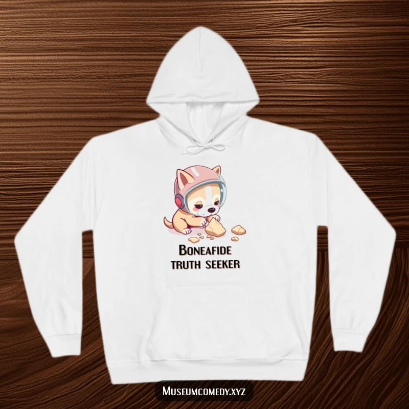 Funny dog hoodie with a determined dog wearing a protective helmet, carefully examining a pottery shard, a cozy and humorous piece.