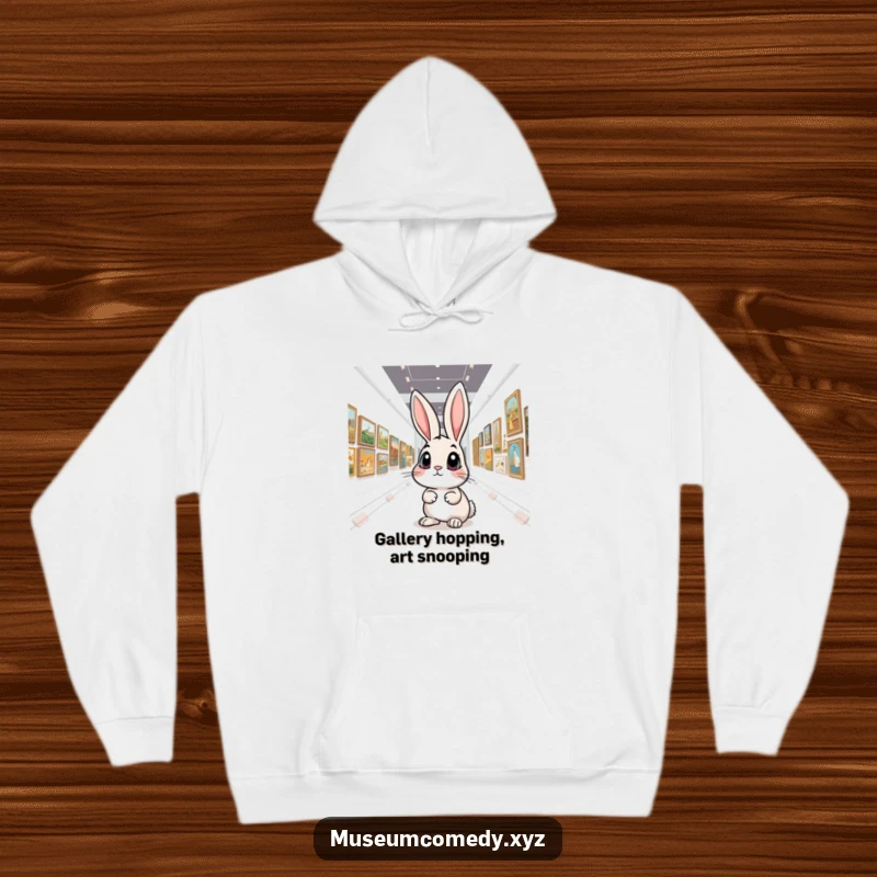 Funny Art Rabbit Hoodie: A curious bunny with big eyes marvels at fine art in a grand gallery, designed for humorous comfort.
